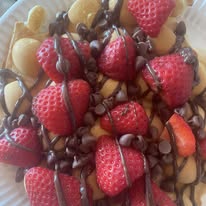 Bubble waffle with strawberries and chocolate