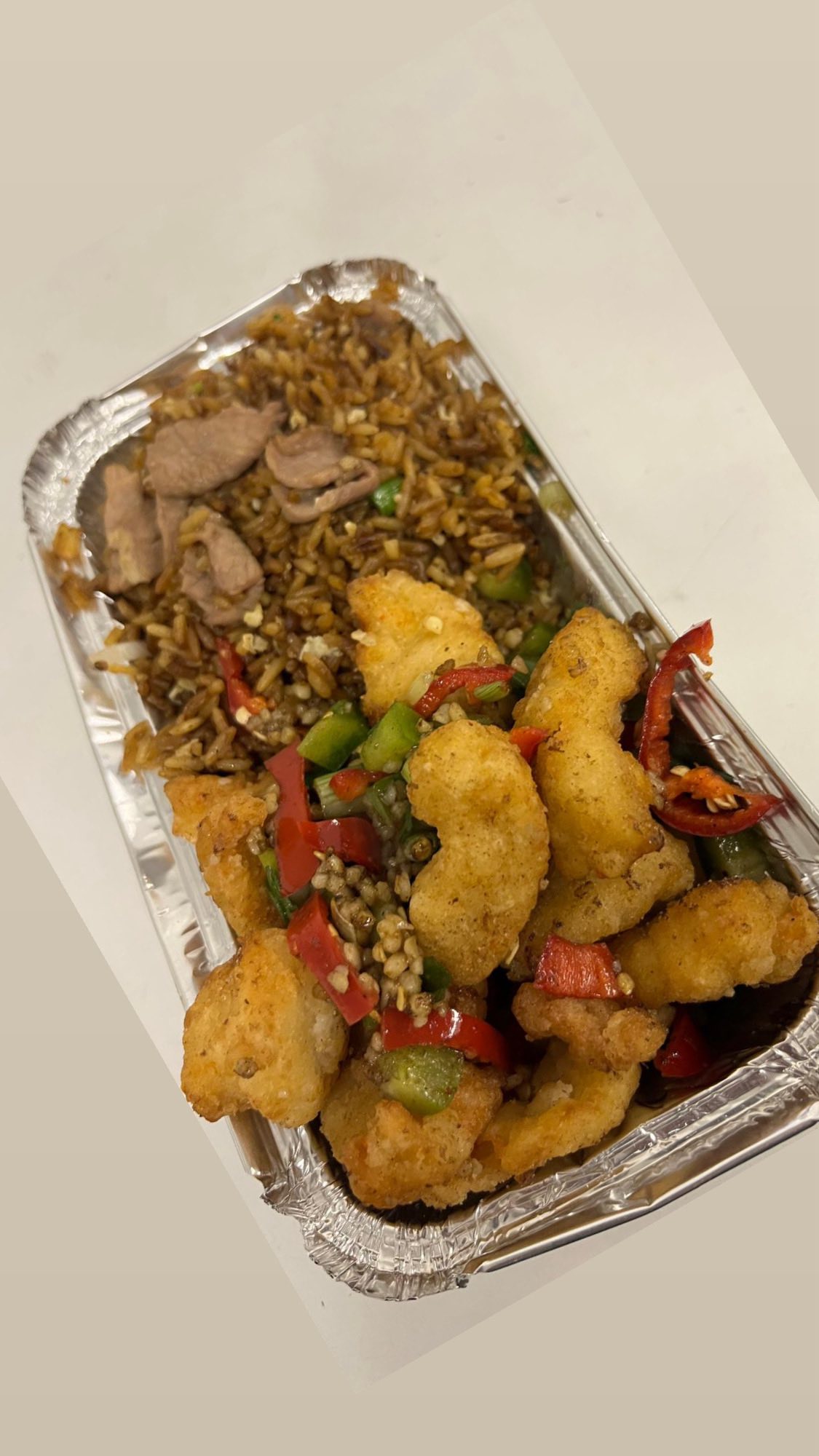 Salt and chilli chicken with special fried rice in a Wokon tray