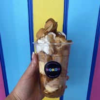 Bubble waffle sundae with cream and banana